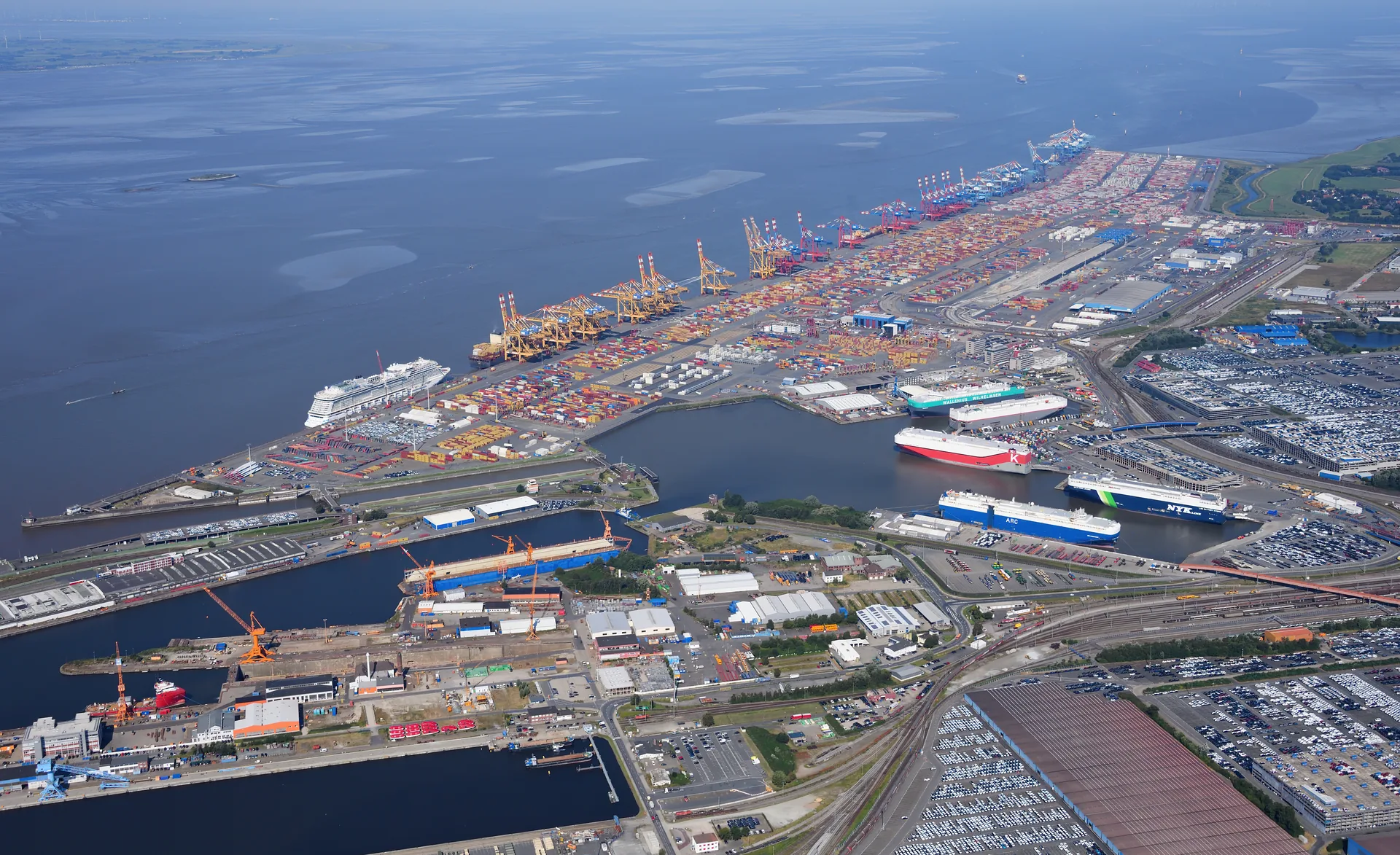 Aerial view of a container terminal, illustrating the export logistics coordinated under FOB and CIF terms
